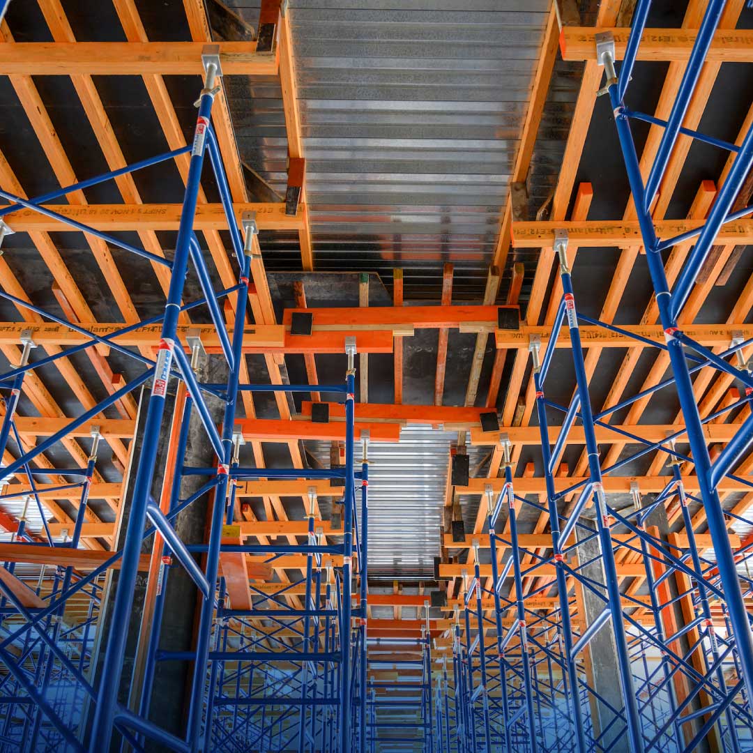 H-frame and V-frame shoring systems supporting a concrete structure